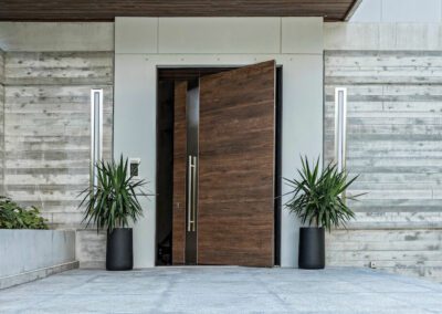 porte d'entree pivotante bois et métal